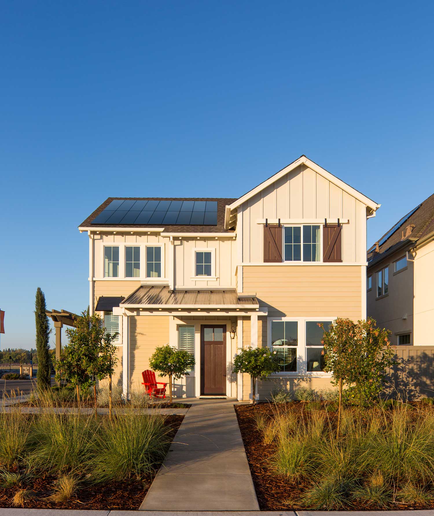 SunPower by Custom Energy provided the solar panels for this beautiful, yellow home in Utah.